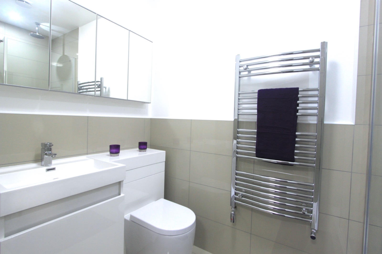 Modern shower room with heated towel rail